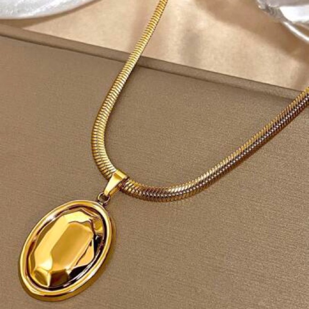 Lustrous Gold Oval Pendant Necklace